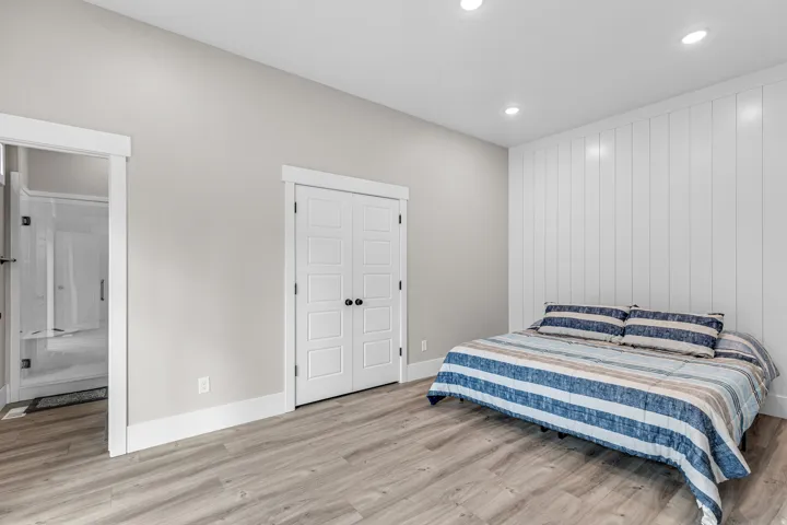 Bedroom featuring light wood-style flooring and recessed lighting