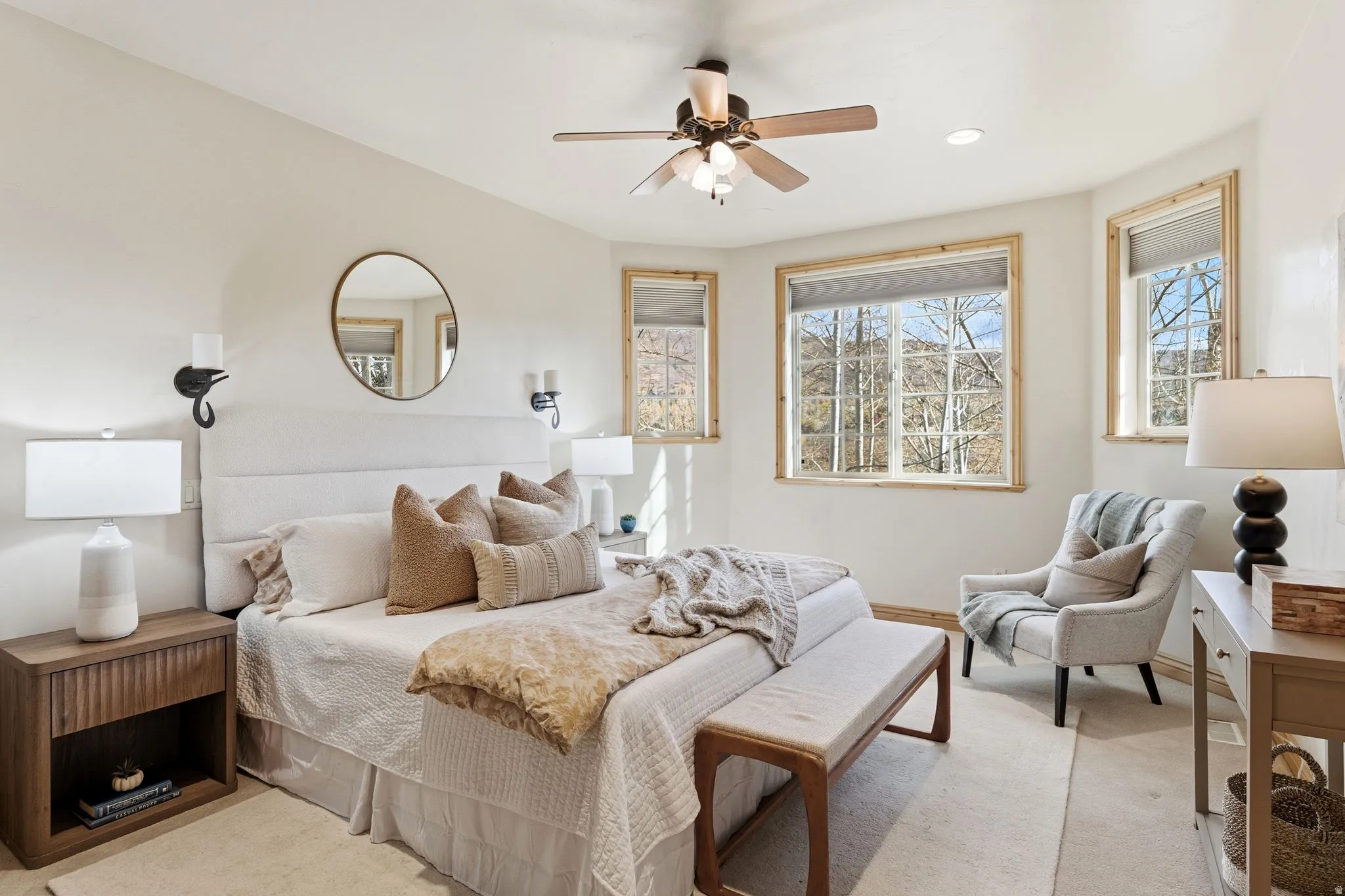 Bedroom with a ceiling fan and recessed lighting
