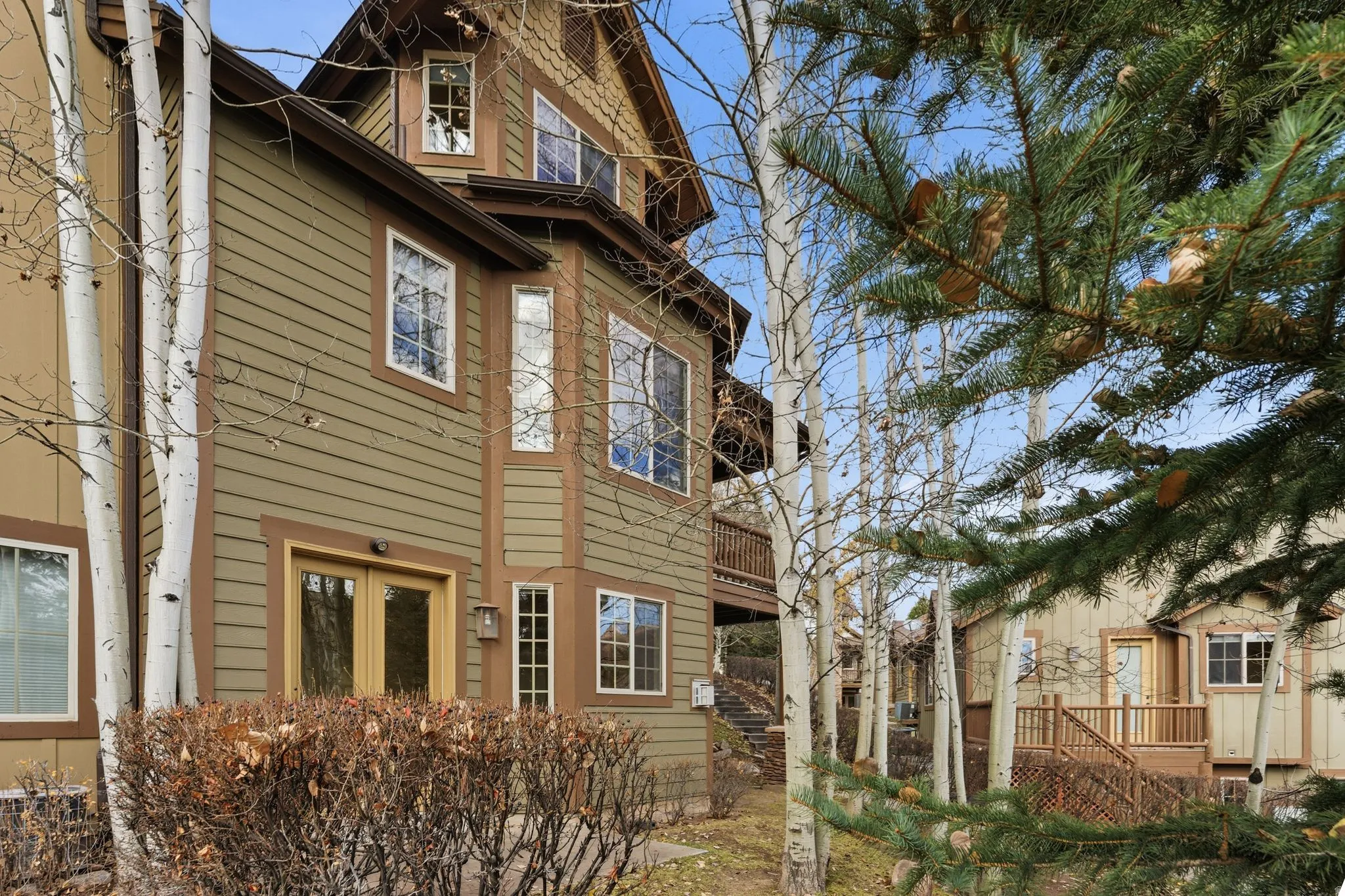 View of home's exterior with a balcony