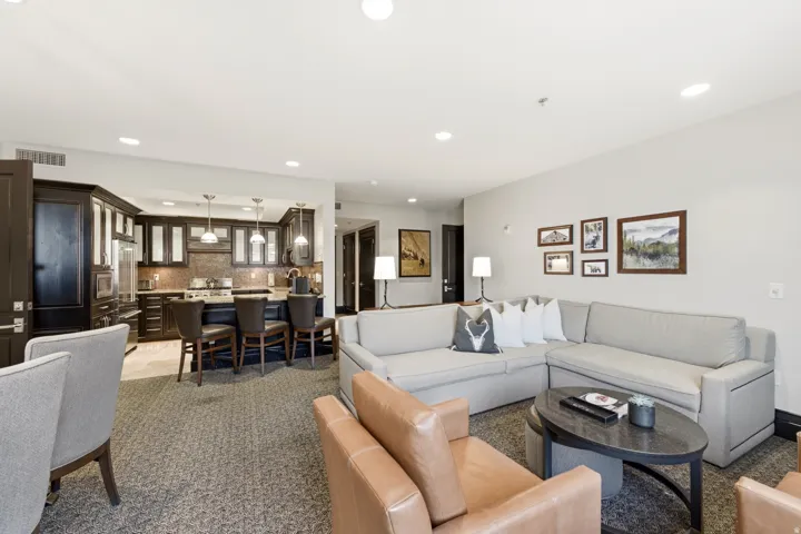 Living room featuring recessed lighting and light carpet