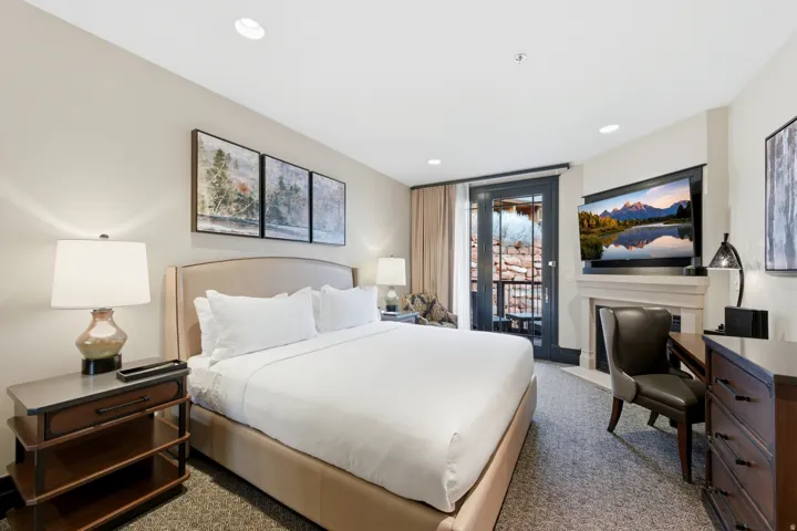 Carpeted bedroom with access to exterior and recessed lighting