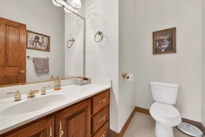 Bathroom featuring vanity and light tile patterned floors