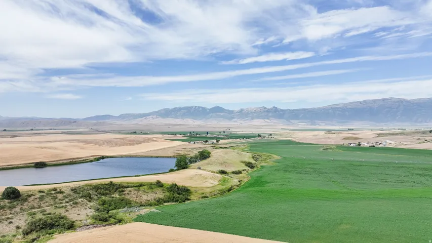 View of home's community with a water and mountain view