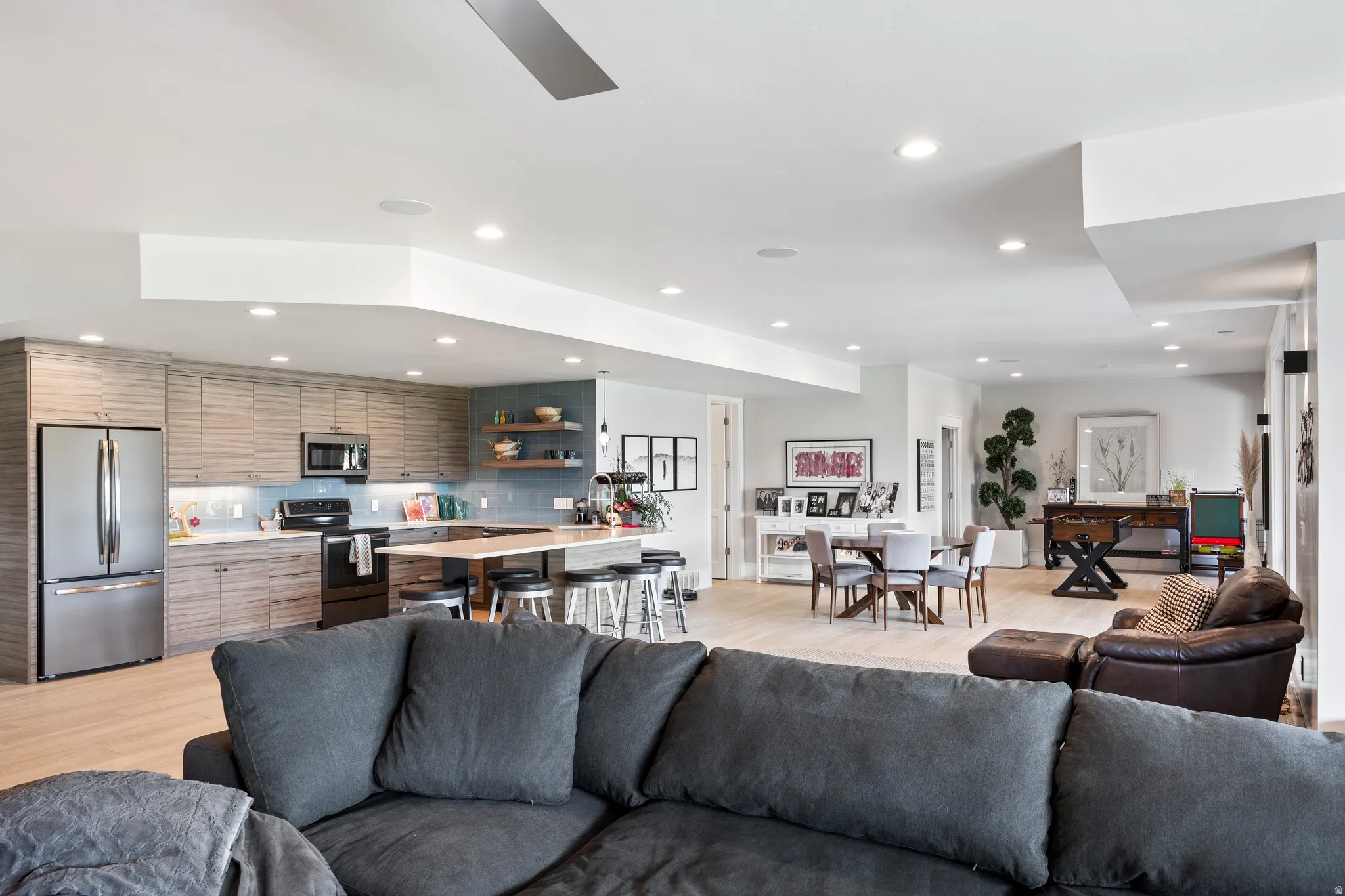 Living room featuring recessed lighting and light wood finished floors