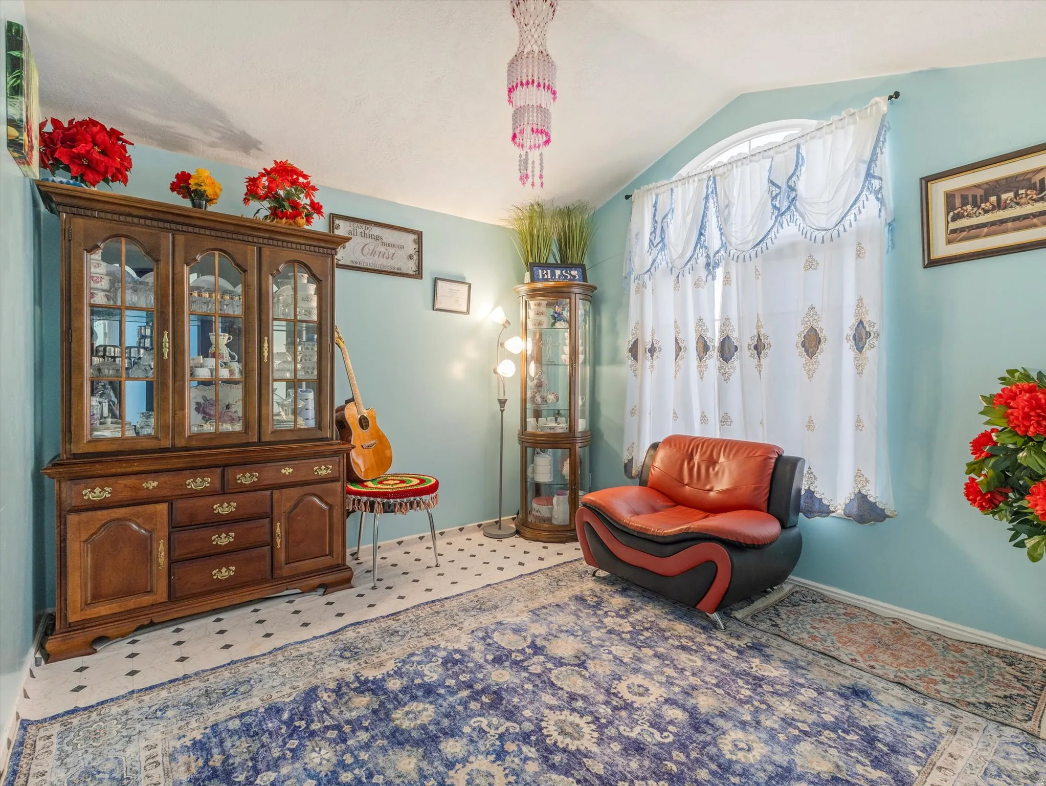 Sitting room featuring lofted ceiling