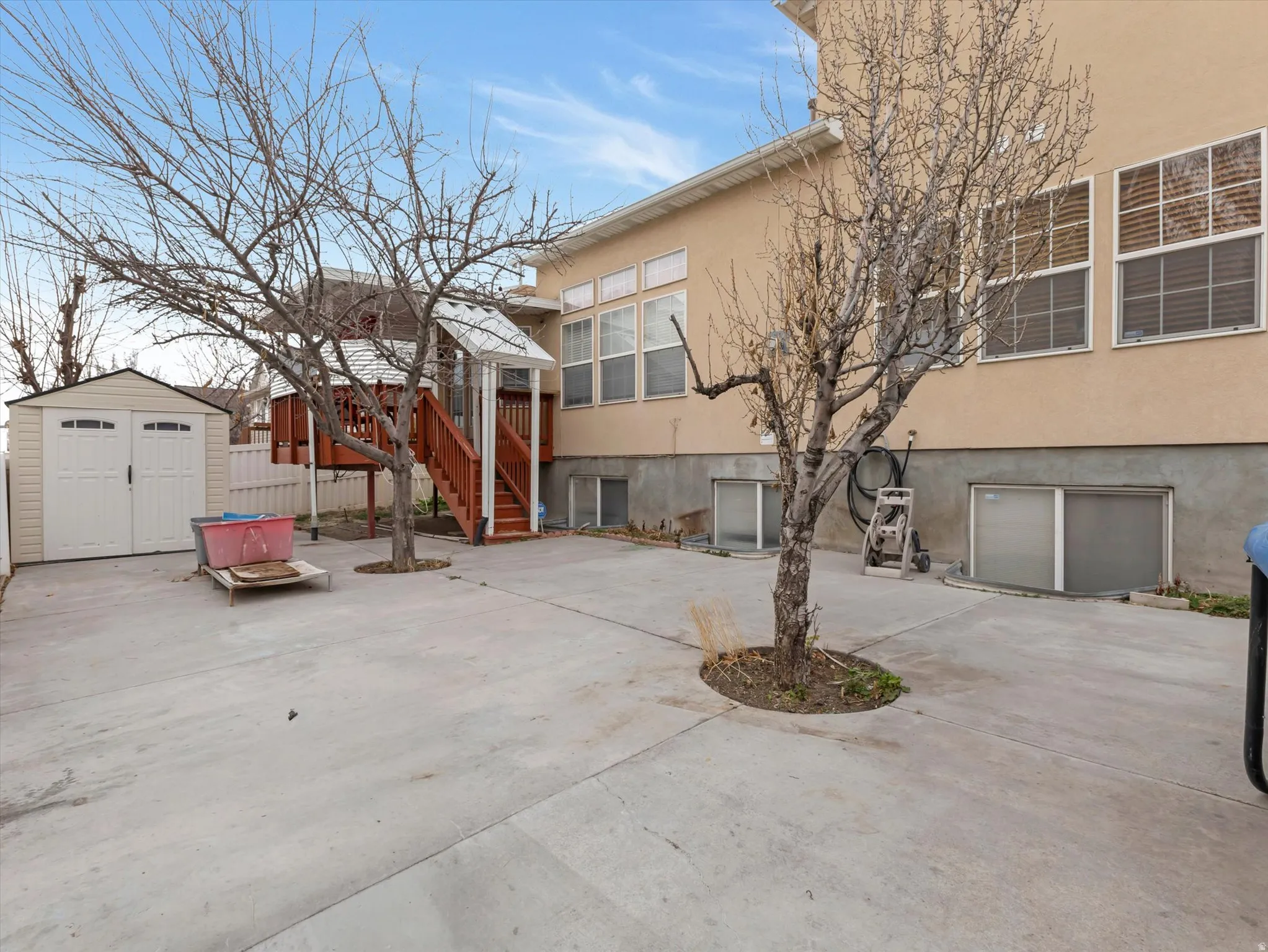 Back of property with a storage unit