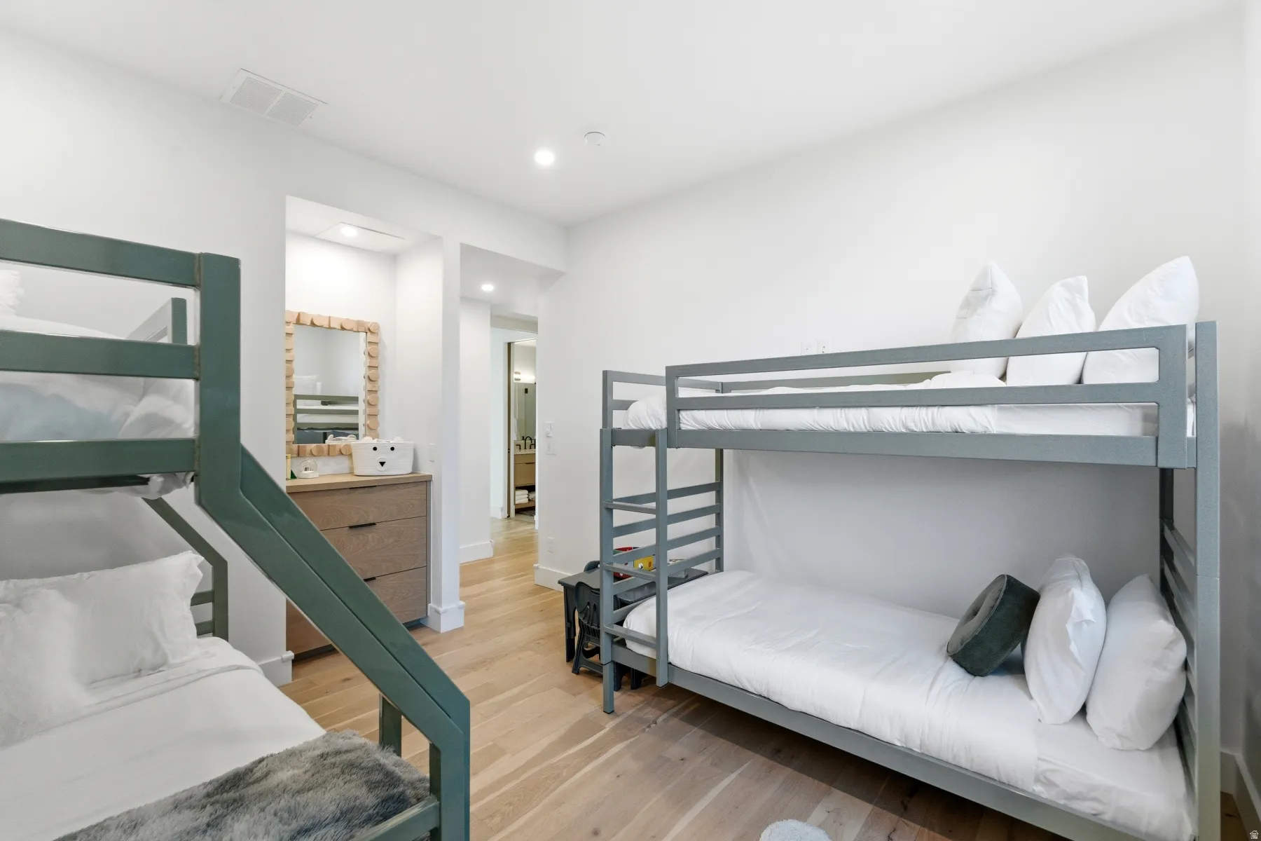 Bedroom featuring light wood-type flooring and recessed lighting