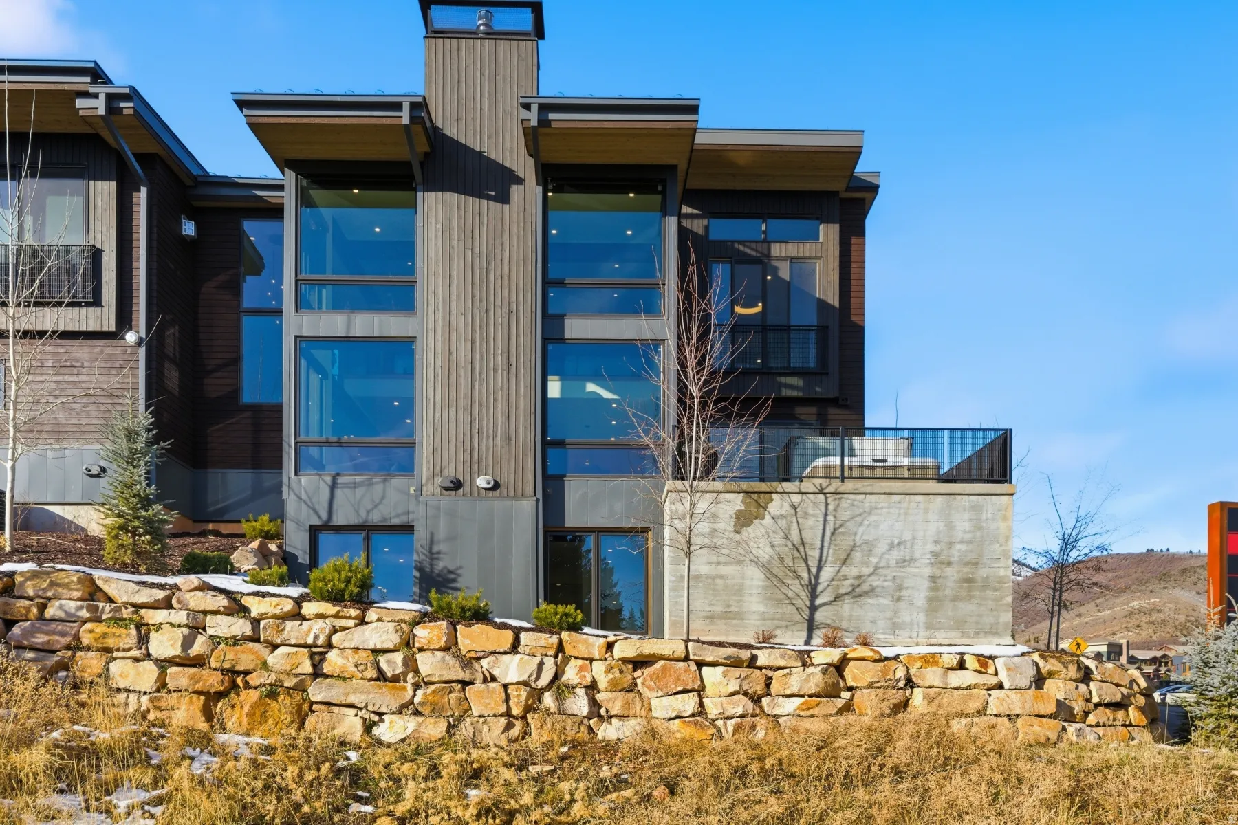 View of side of property featuring a chimney