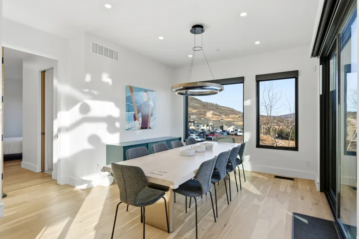 Dining room featuring recessed lighting and light wood-style flooring