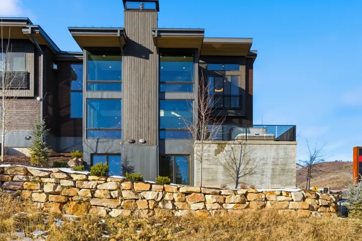 View of side of property featuring a chimney