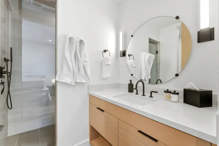 Full bath with vanity and a walk in shower
