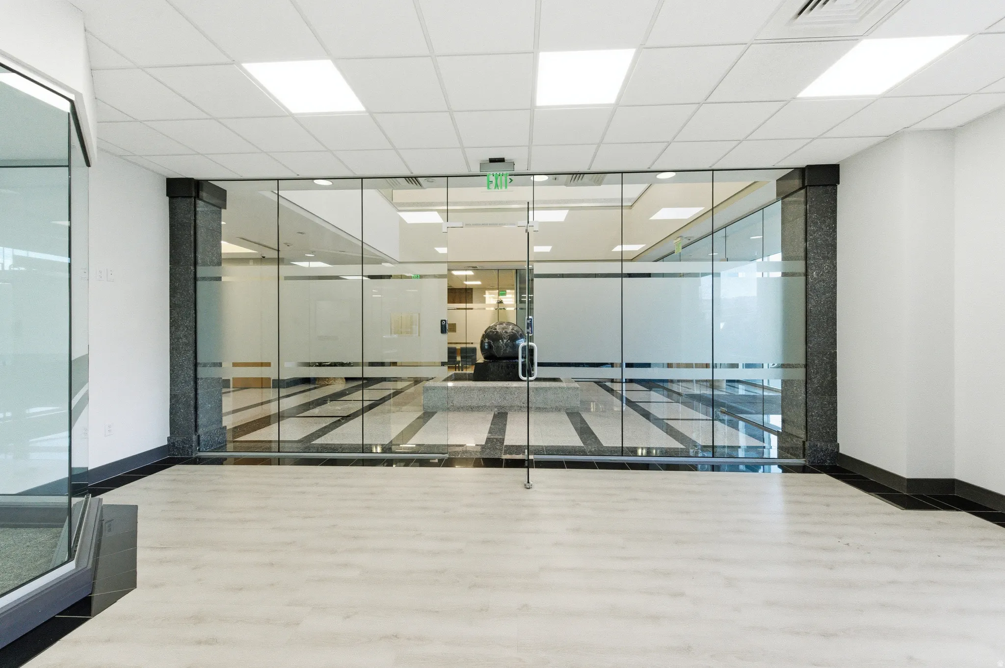 Building lobby with a paneled ceiling