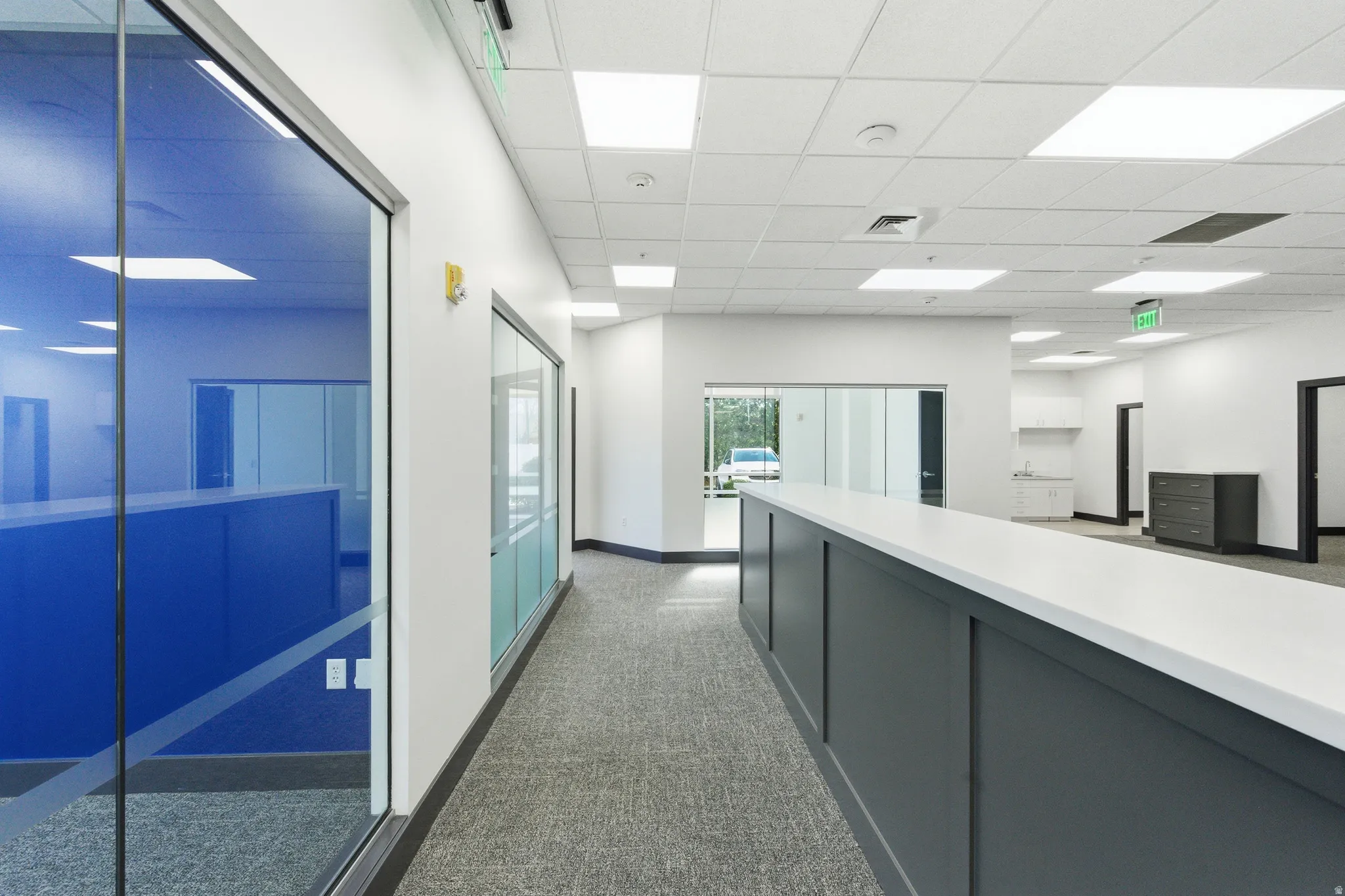 Welcome area featuring a drop ceiling