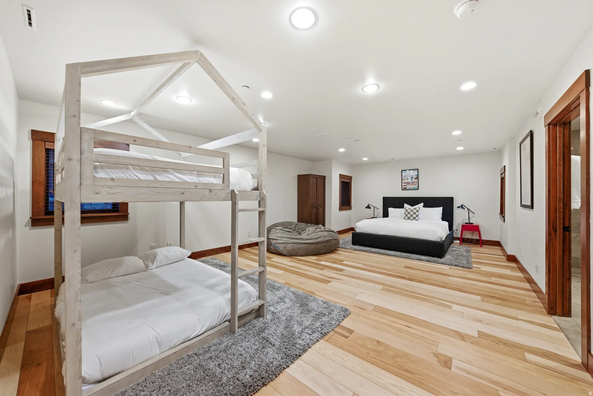 Bedroom featuring light wood-style flooring and recessed lighting