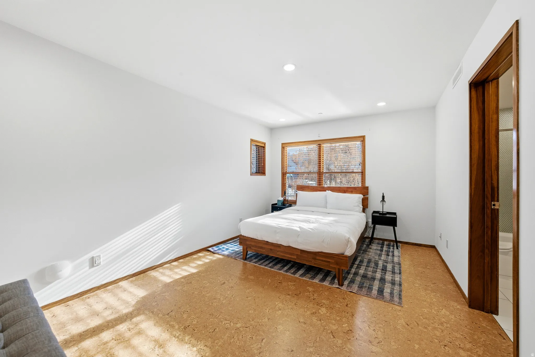 Bedroom featuring baseboards and recessed lighting