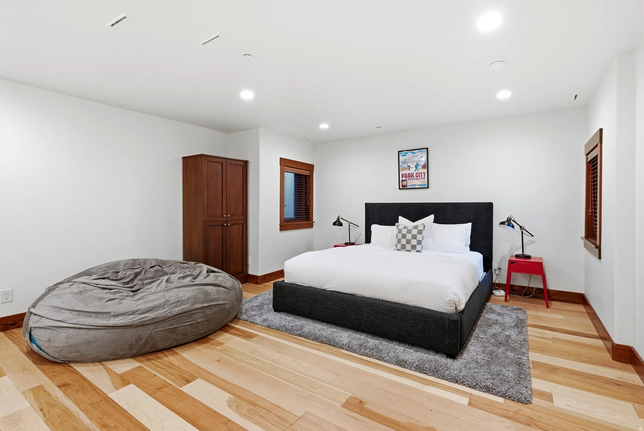 Bedroom with recessed lighting and light wood-style floors