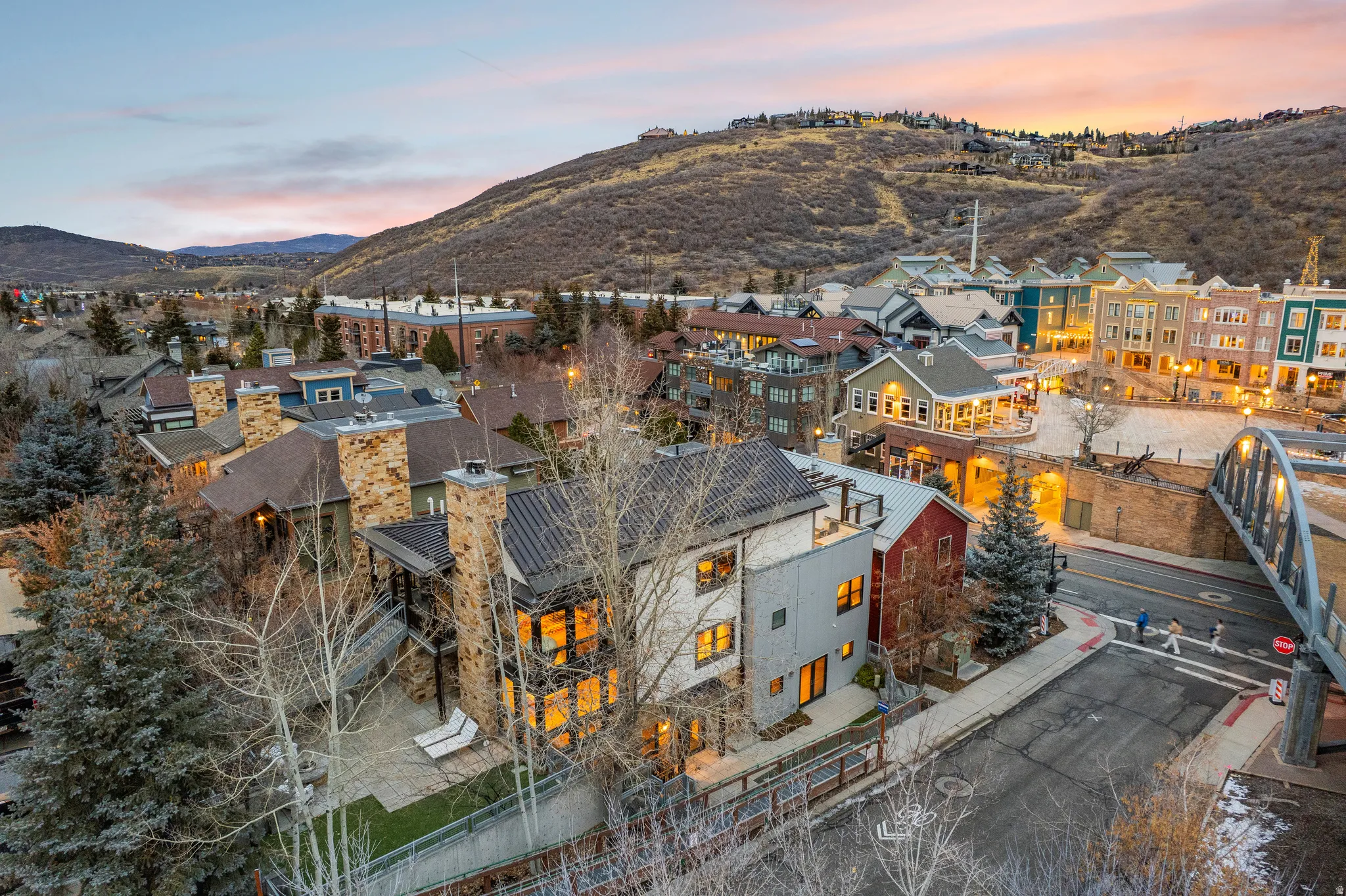 Aerial view at dusk of a mountain view and a residential view