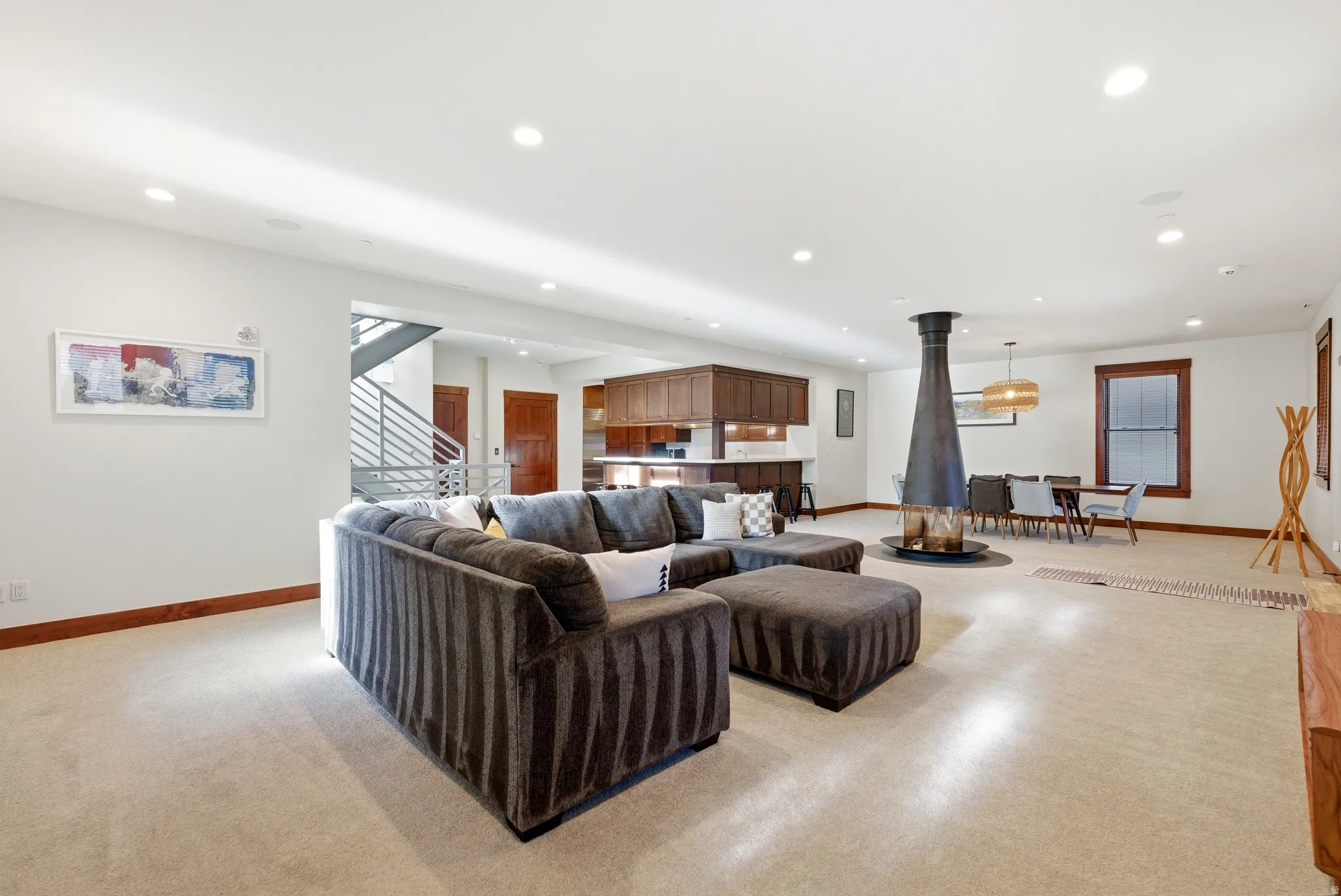 Living room with recessed lighting and baseboards