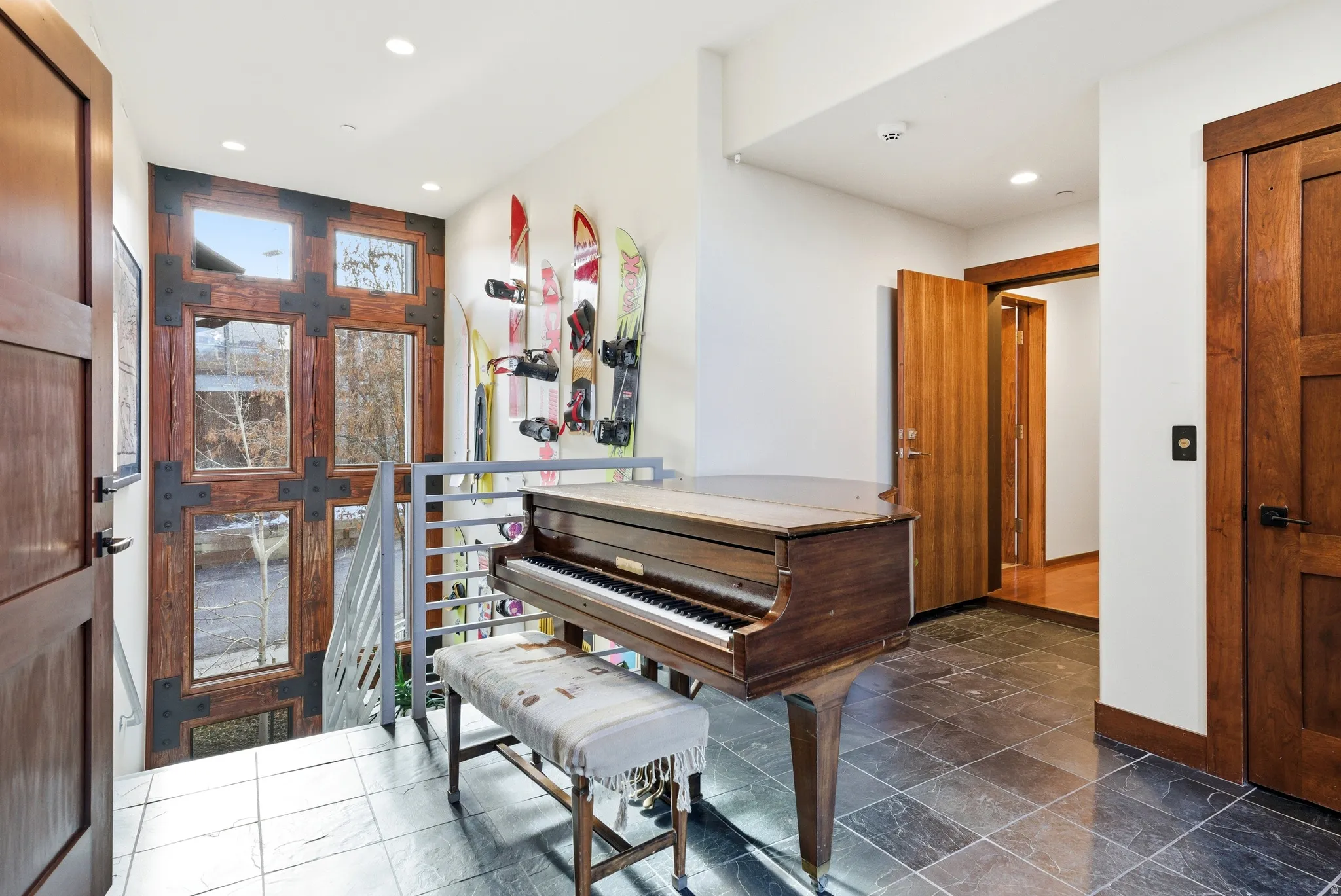 Entrance foyer featuring recessed lighting and baseboards