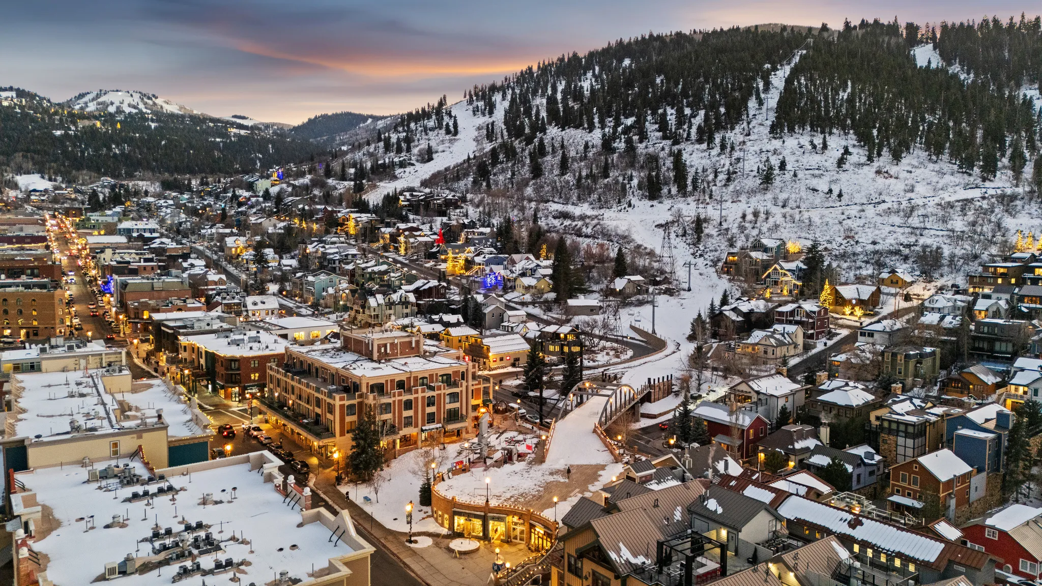 Snowy aerial view featuring a mountain view