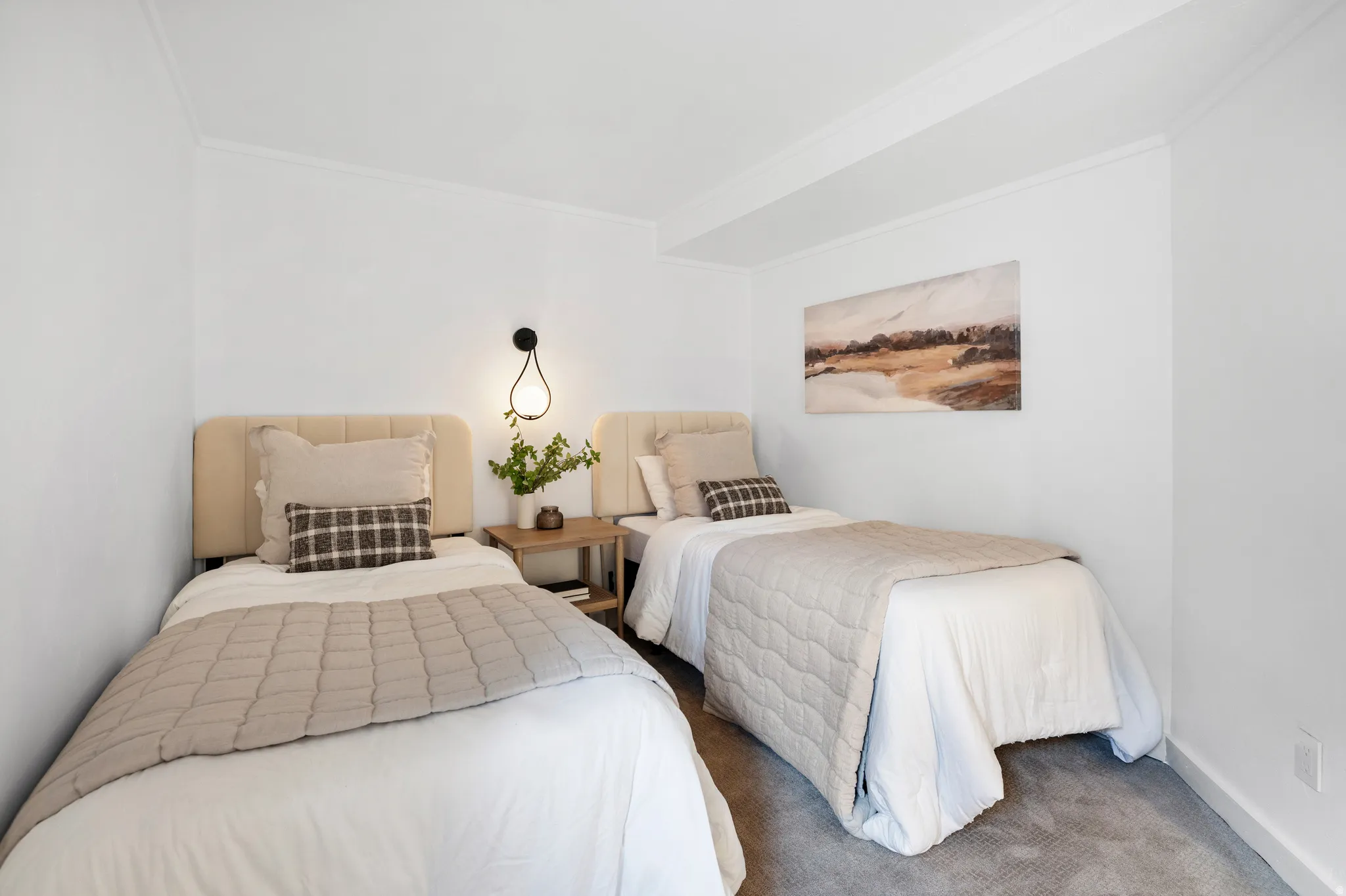 Carpeted bedroom featuring ornamental molding