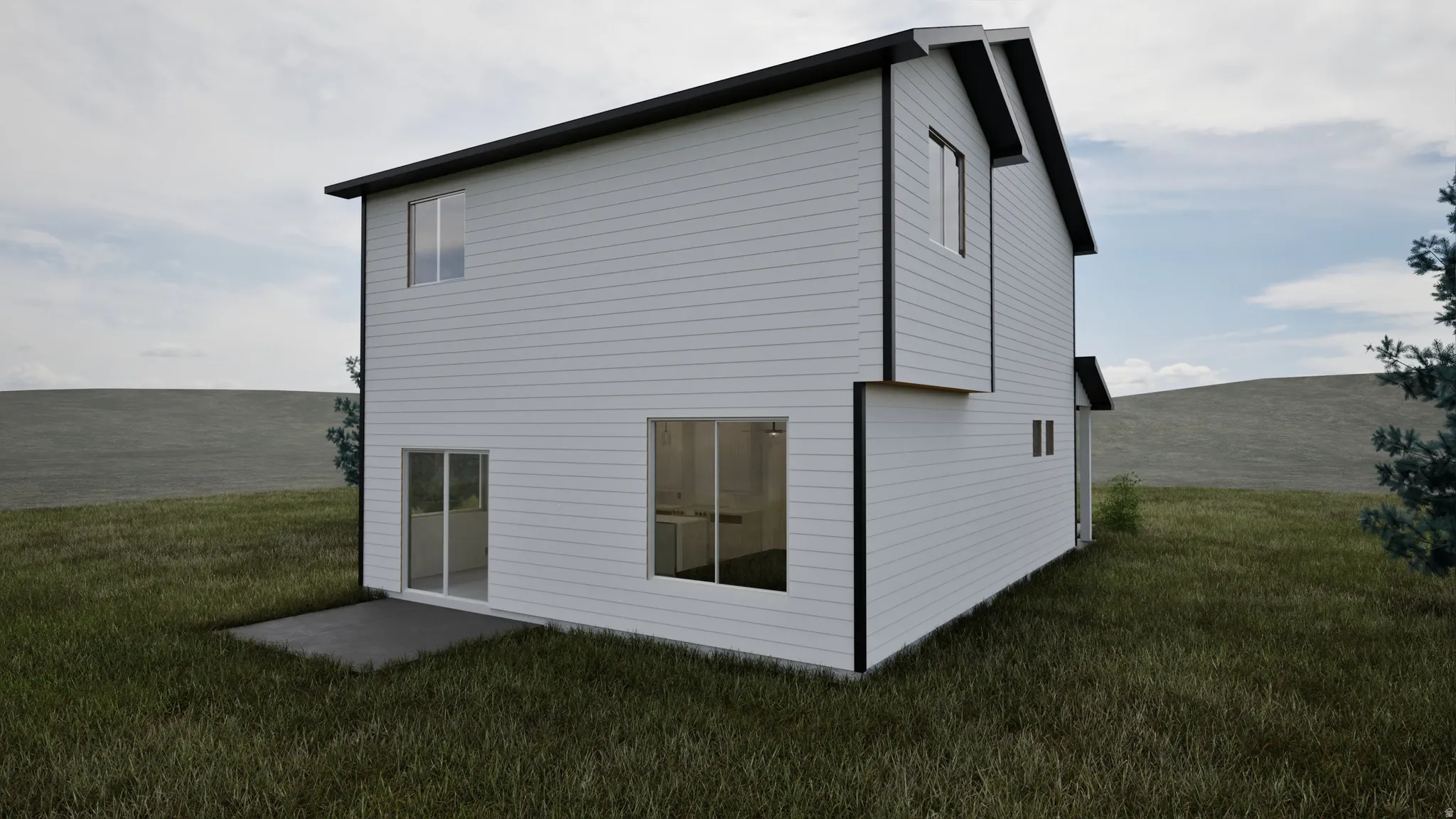 Back of property with a lawn and a patio area