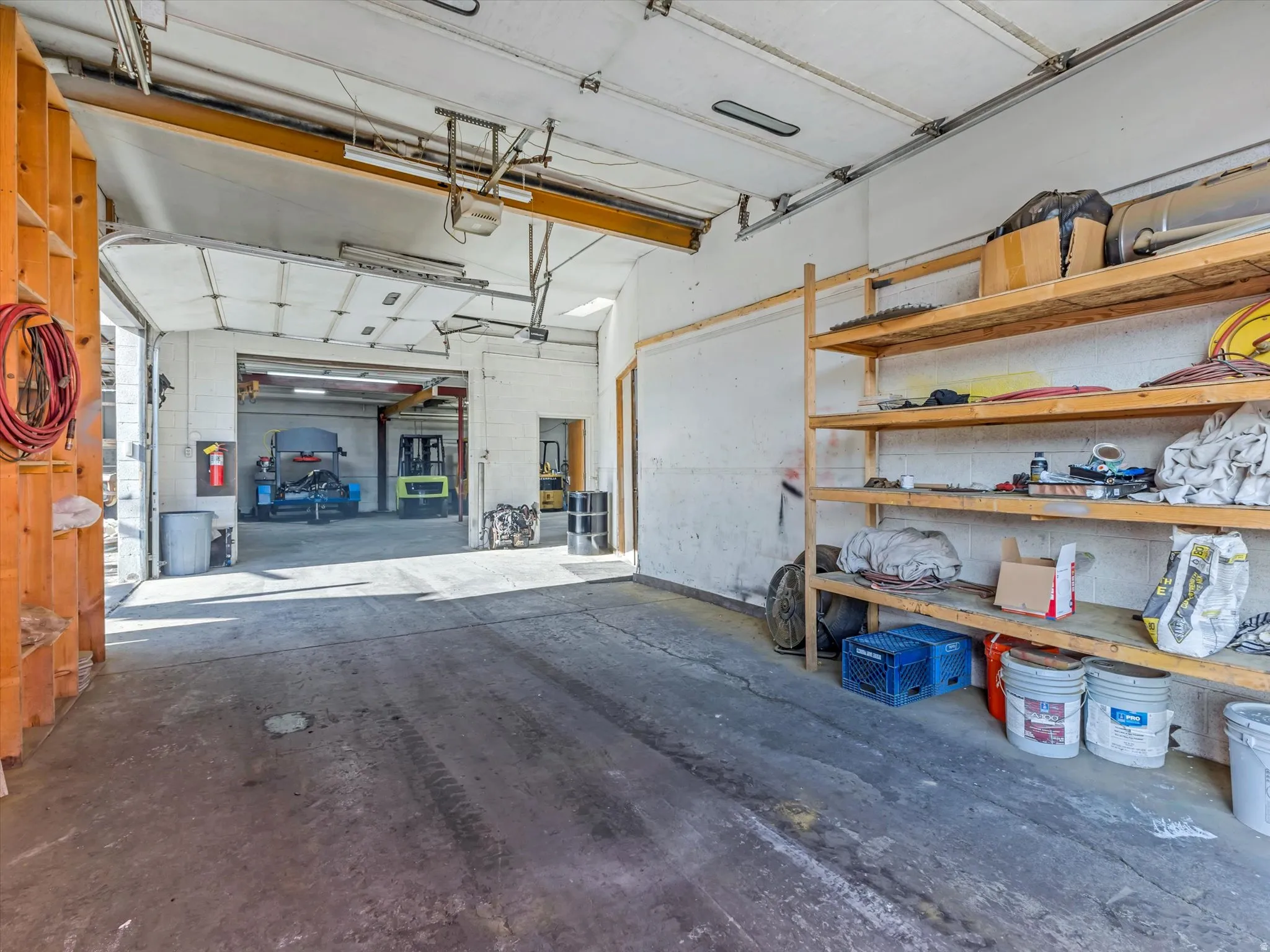 Garage featuring a garage door opener