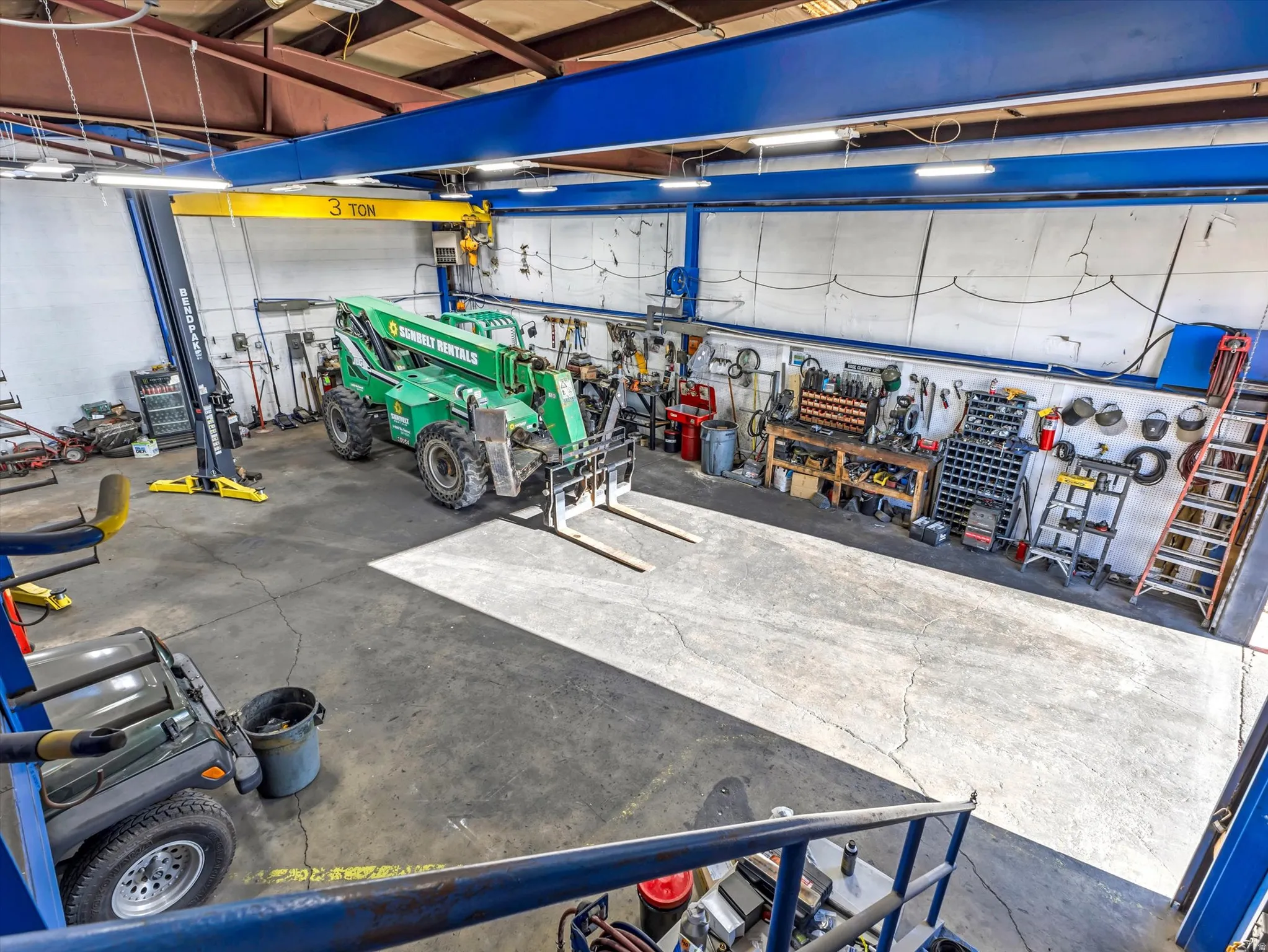 Garage featuring a workshop area