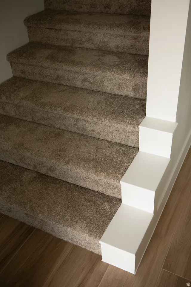 Stairs with wood finished floors