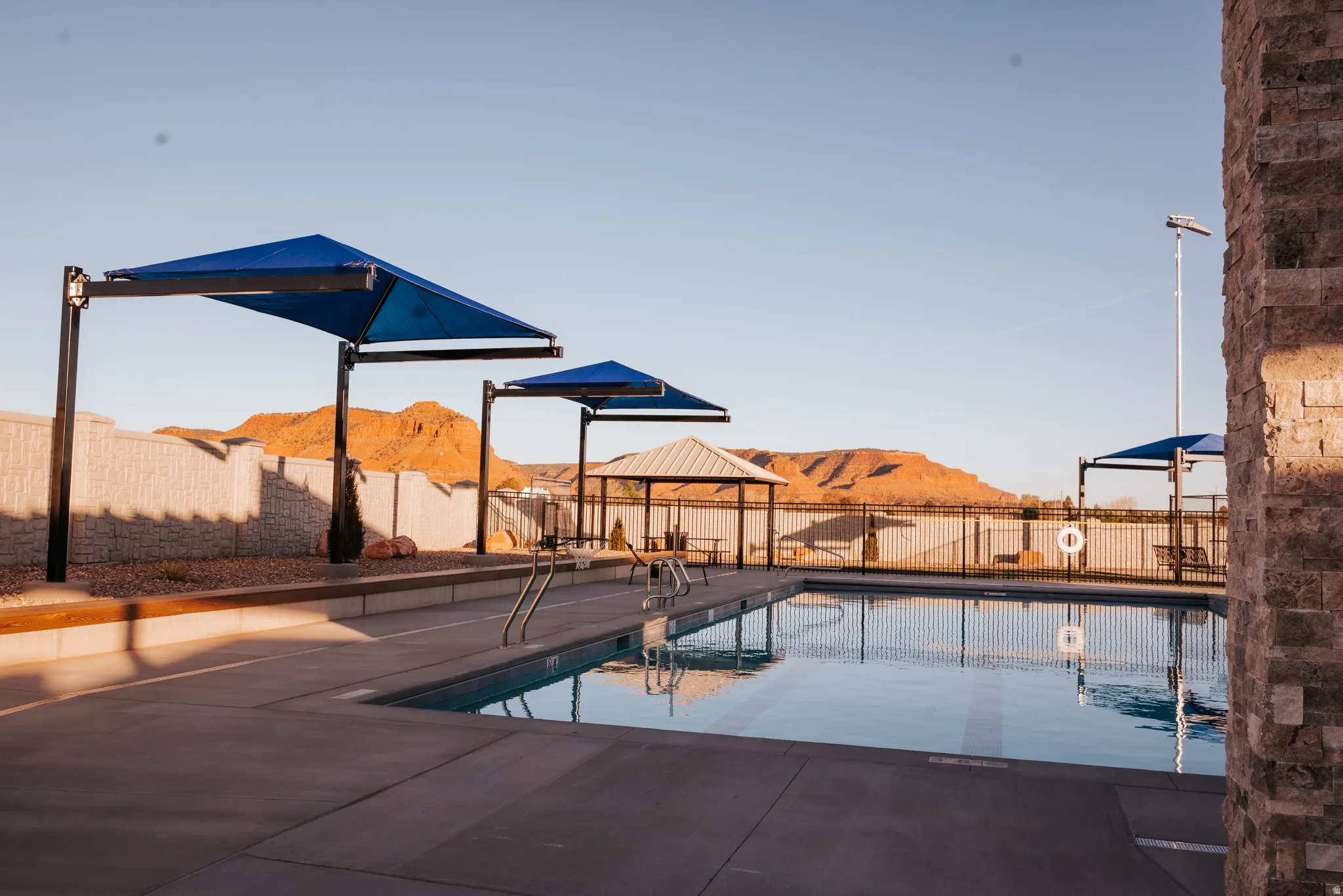 Community pool featuring a mountain view, a patio area, and a gazebo