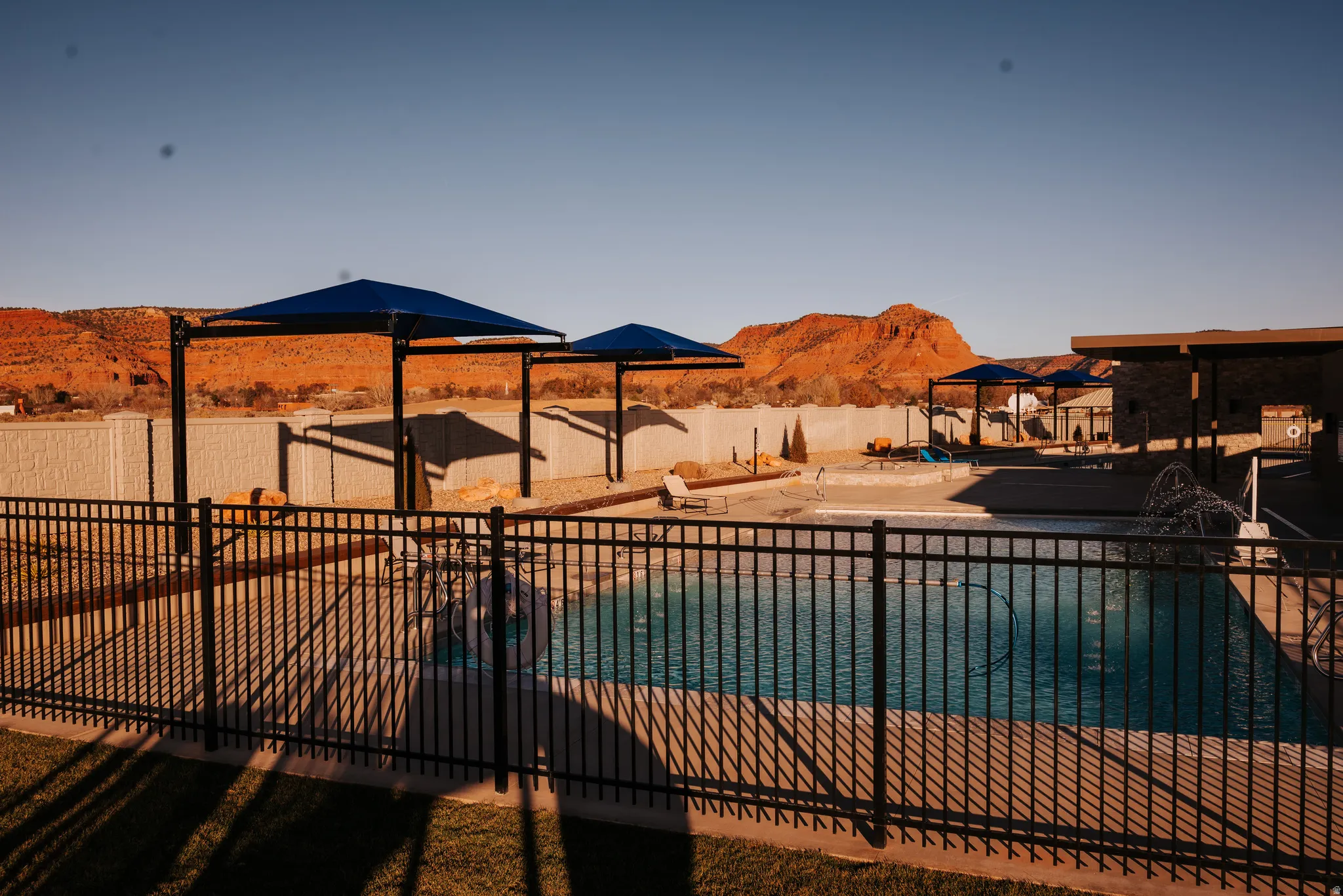 View of pool featuring a patio and a mountain view
