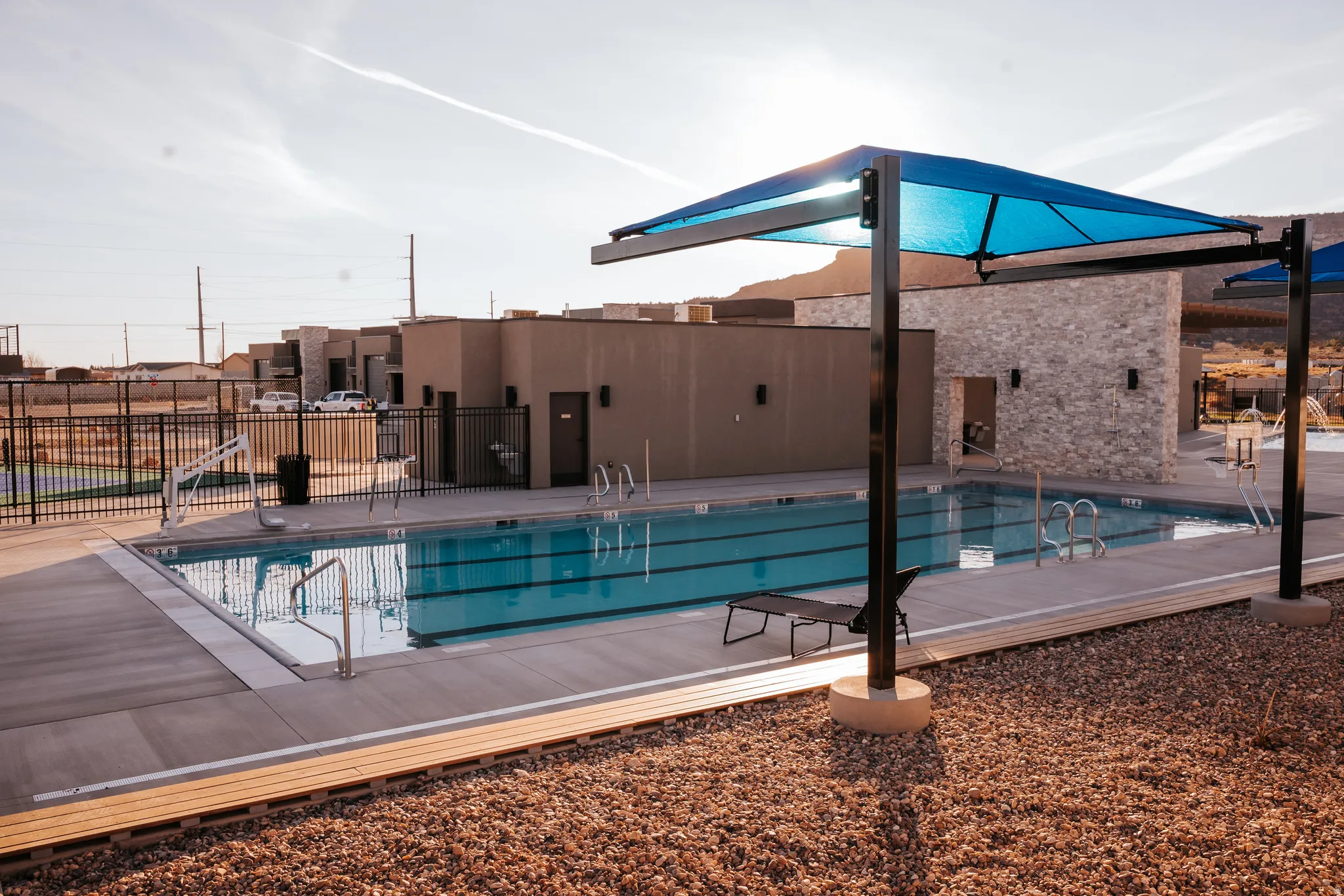 Community pool featuring a patio