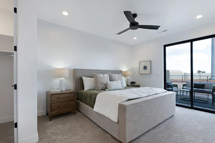 Bedroom with ceiling fan, access to outside, light carpet, and recessed lighting