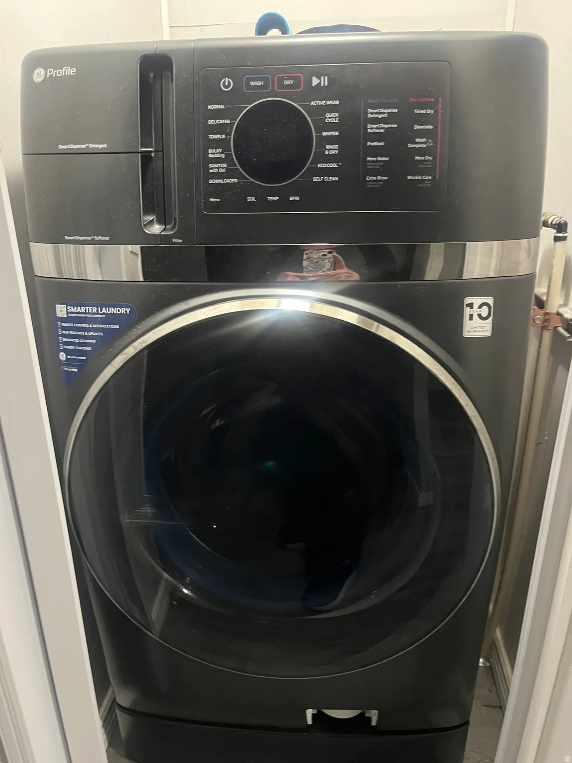 Washroom featuring washer /dryer combo