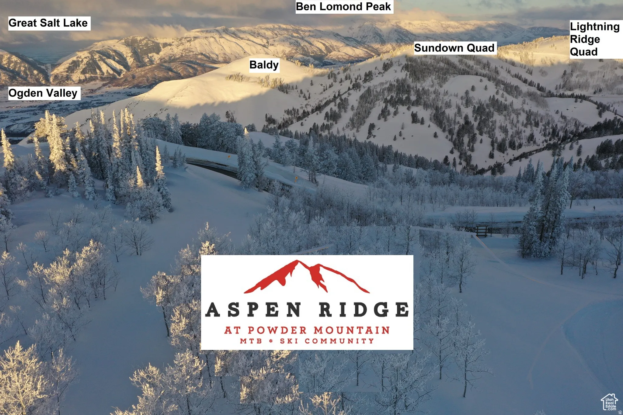 Snowy aerial view with a mountain view
