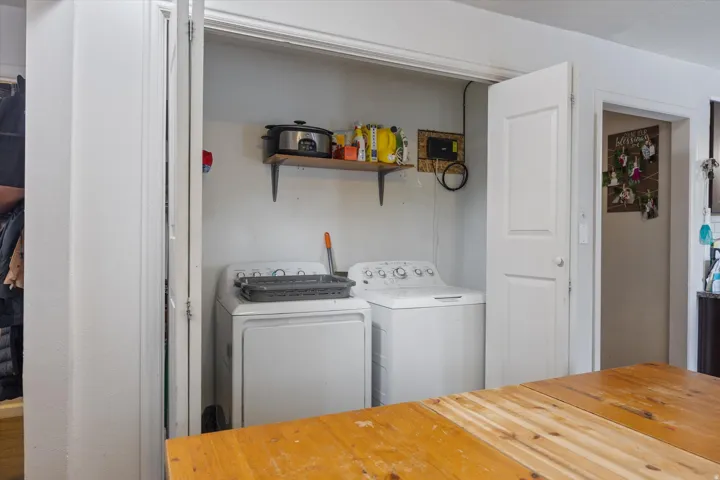 Washroom featuring washer and dryer