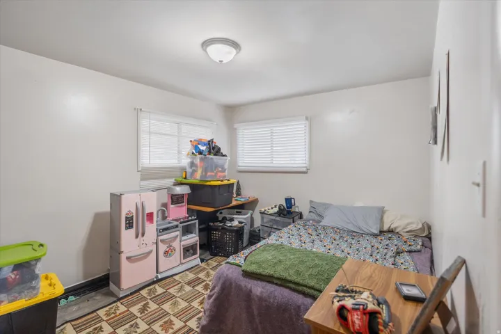 Bedroom with baseboards