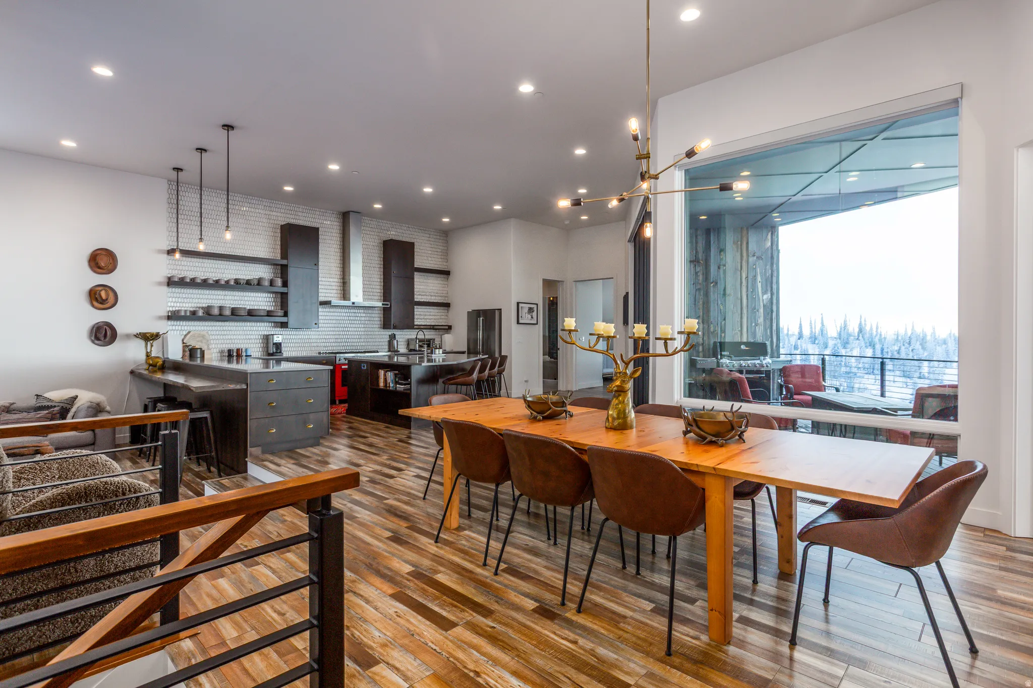 Dining area featuring a chandelier, wood finished floors, and recessed lighting