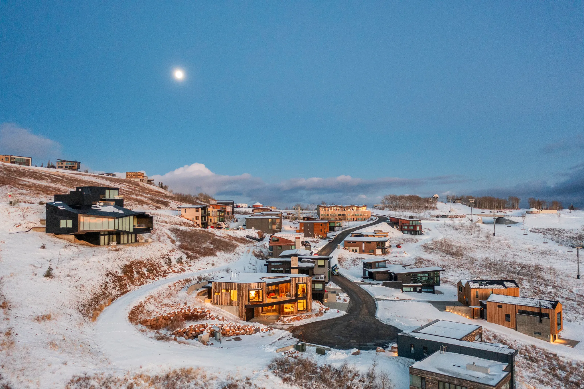 Snowy aerial view with a residential view