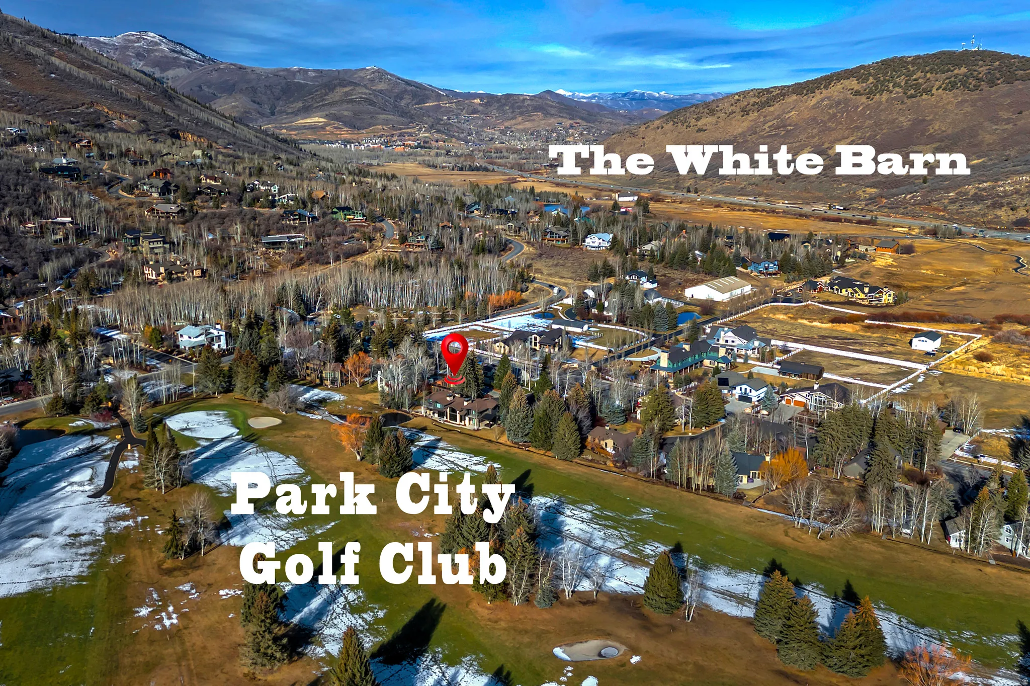 Aerial view of property and surrounding area with mountains