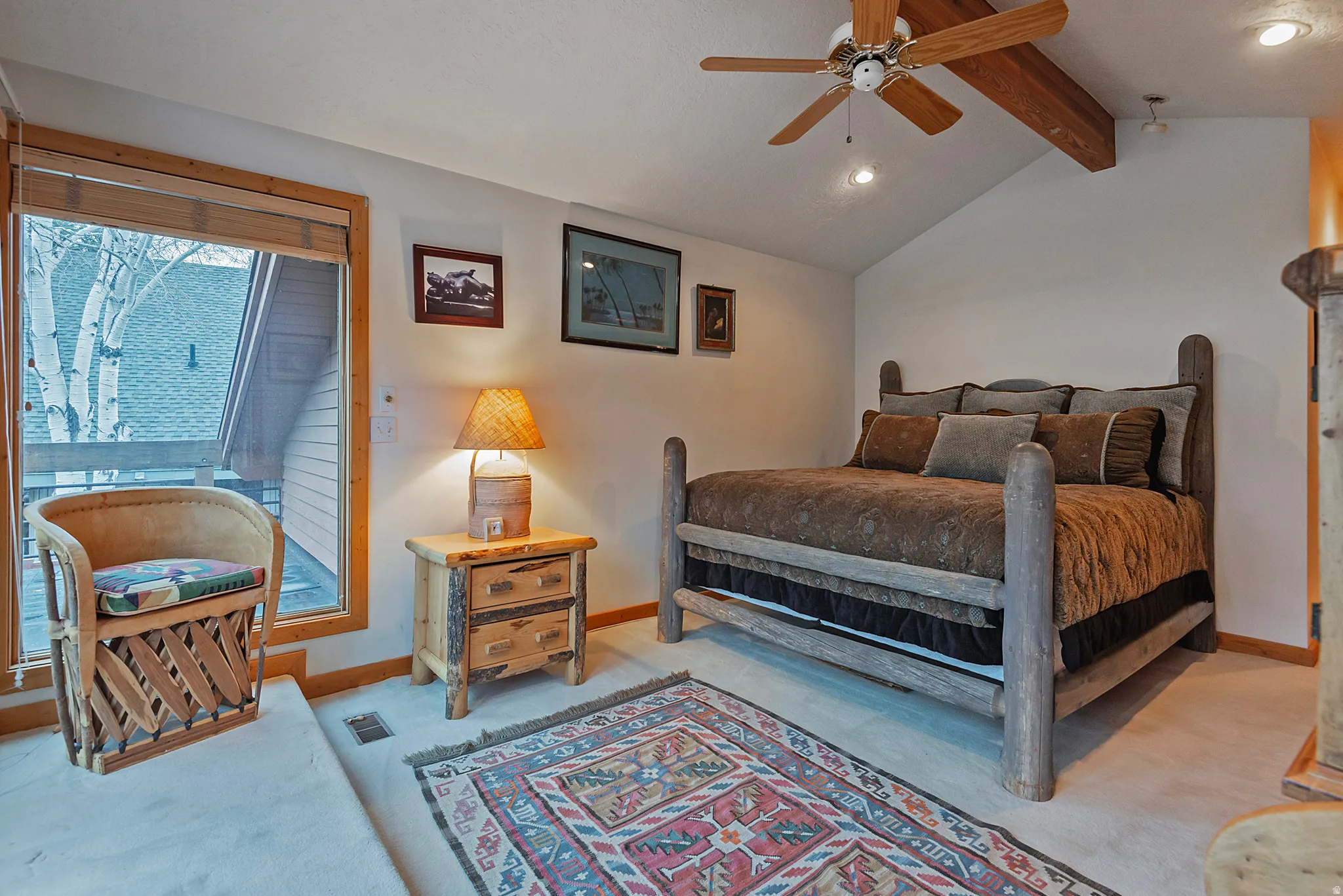 Bedroom with a ceiling fan and recessed lighting