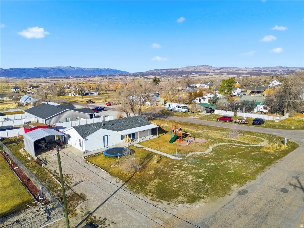 Aerial view of residential area with mountains