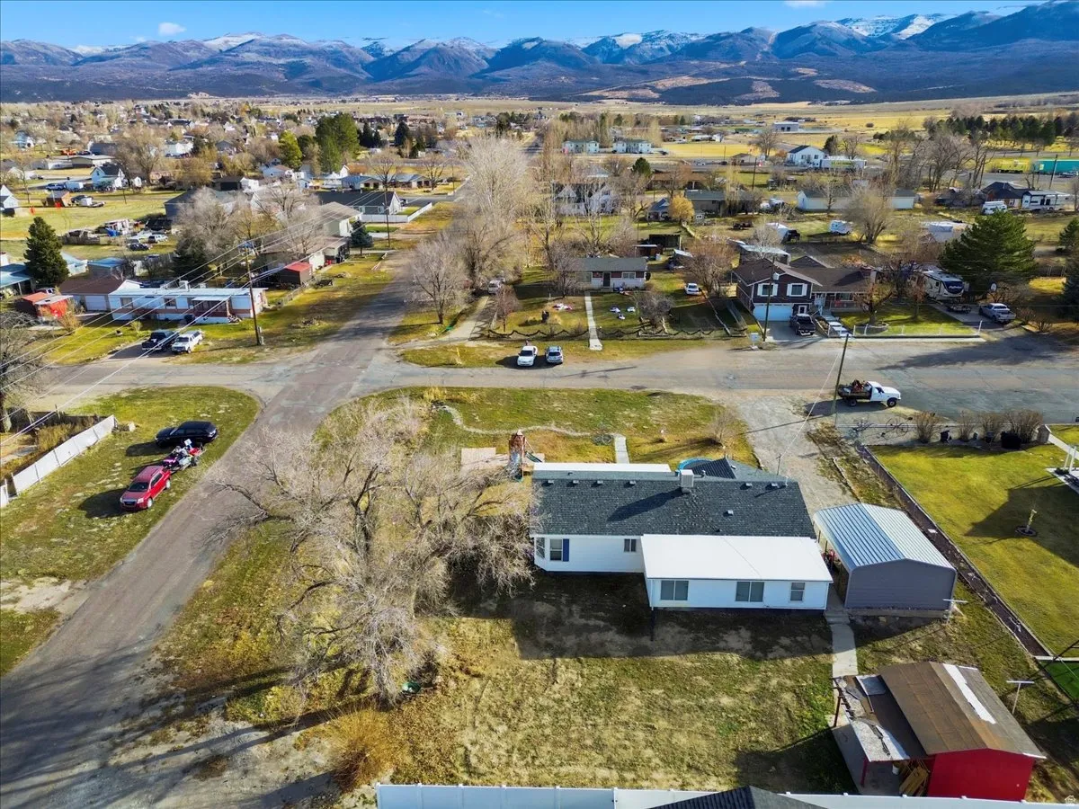 Aerial view of residential area with a mountain backdrop