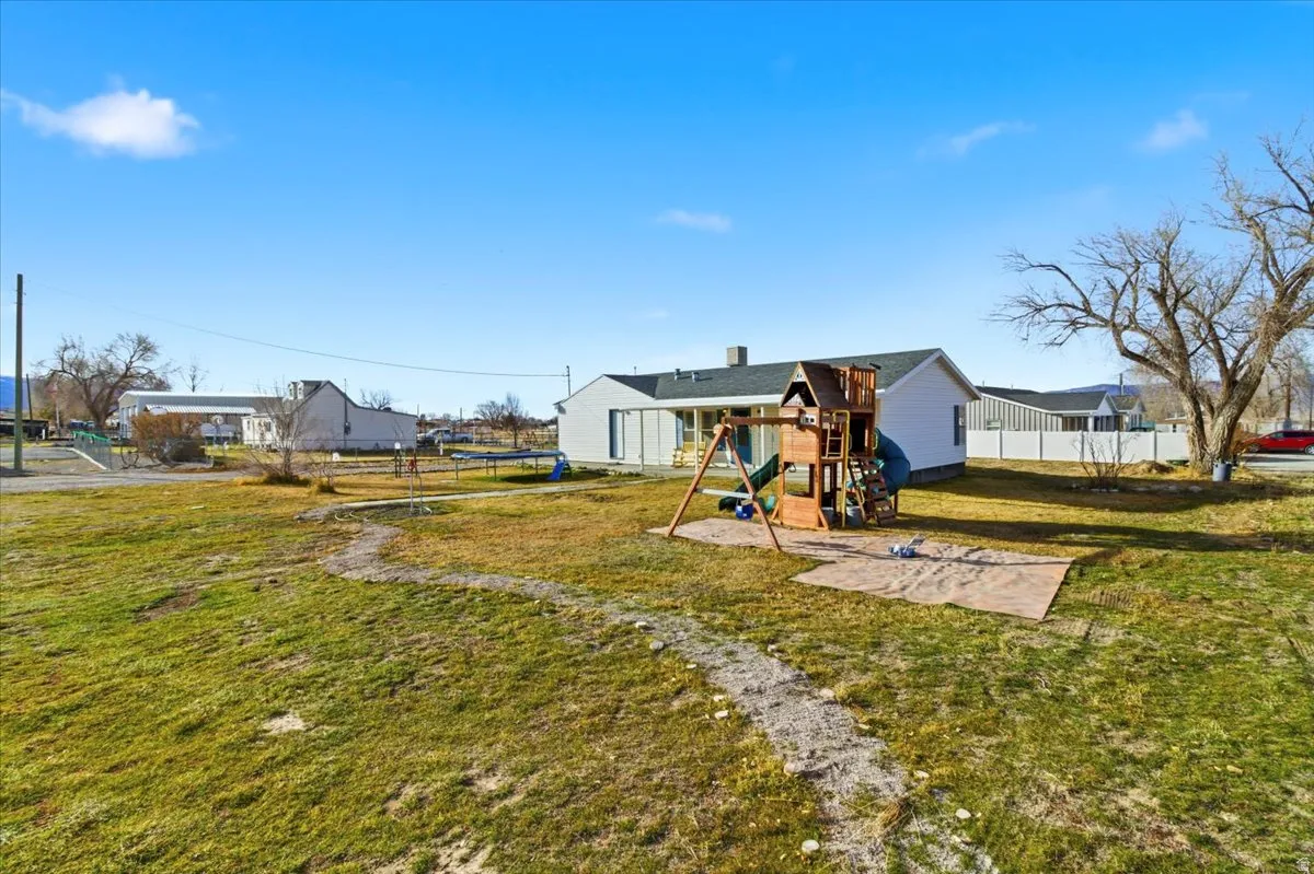 View of yard featuring a playground