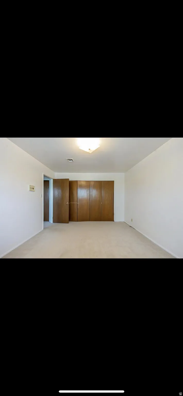 Spare room with carpet
