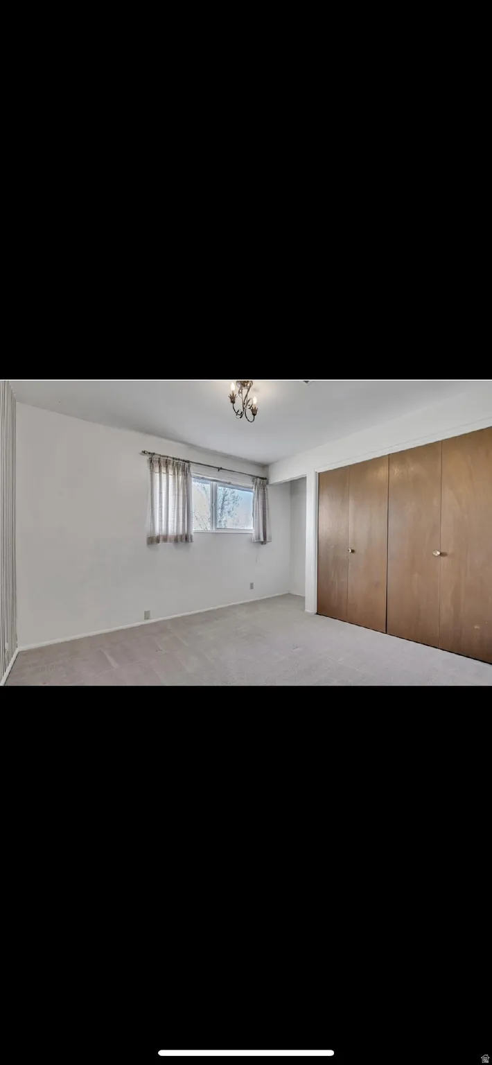 Below grade area featuring carpet floors