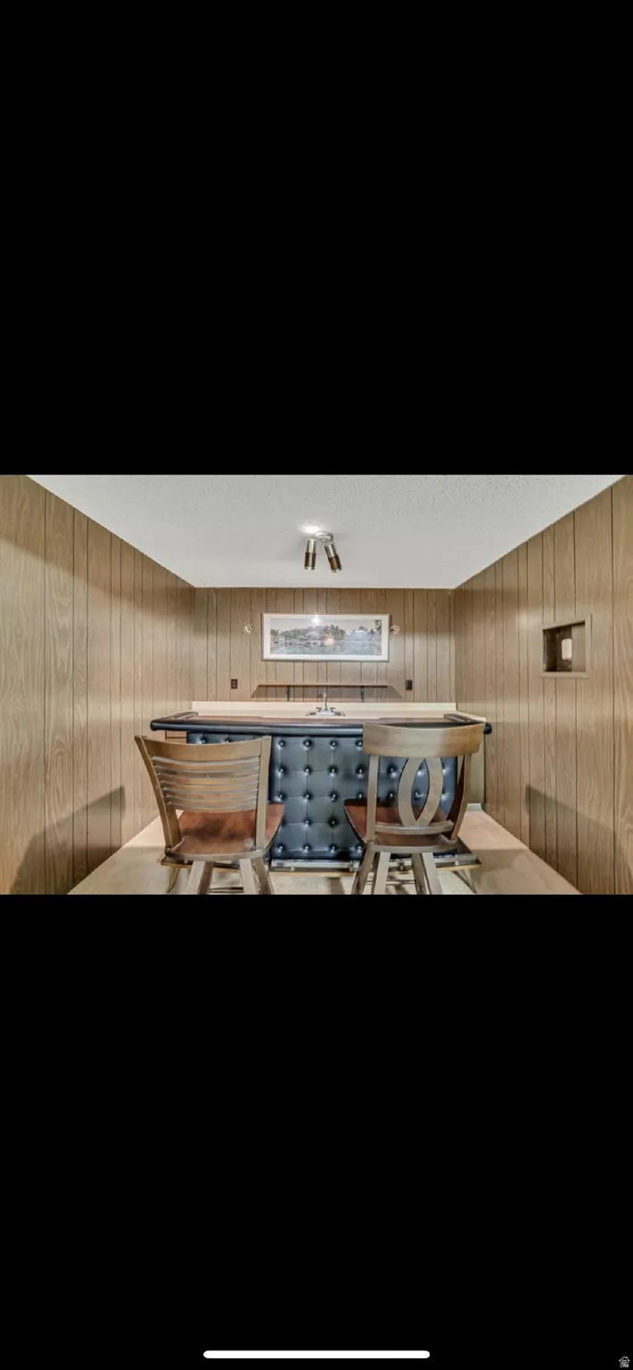 Reception featuring wood walls