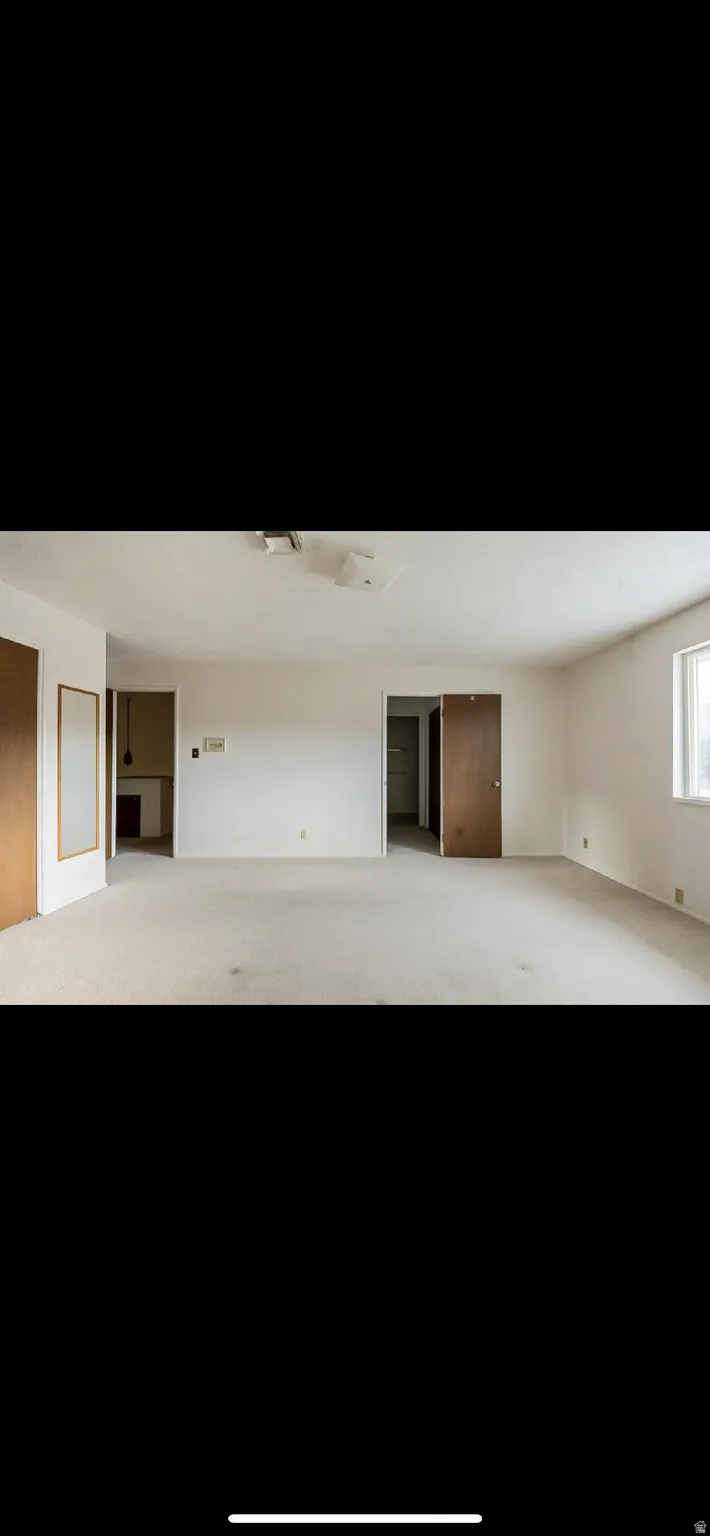 Spare room with carpet floors