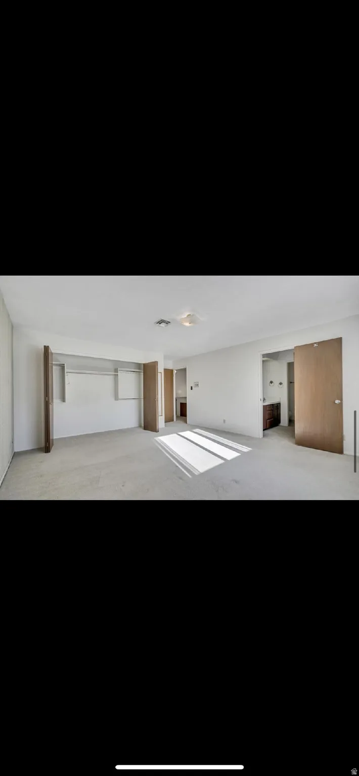 Misc room with carpet floors