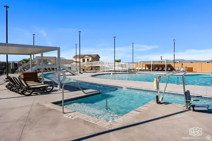 Community pool featuring a patio area